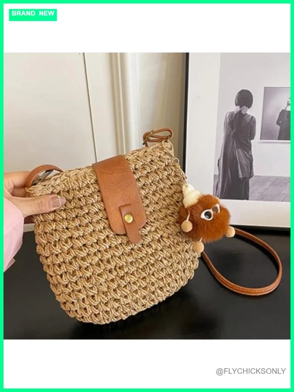Handwoven Straw Crossbody Bag with Adjustable Strap and Pom-Pom Charm